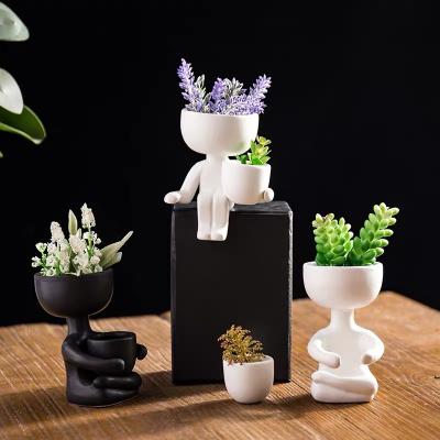 China Home Decor Glazed Modern Cheap Wholesale Modern Mini Bonsai Body Planters Decorative Black Ceramic Planter Flower Pots Pot for sale