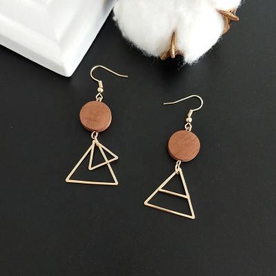 China 2021 original fashion simple geometric wooden triangle high quality asymmetrical earrings for sale