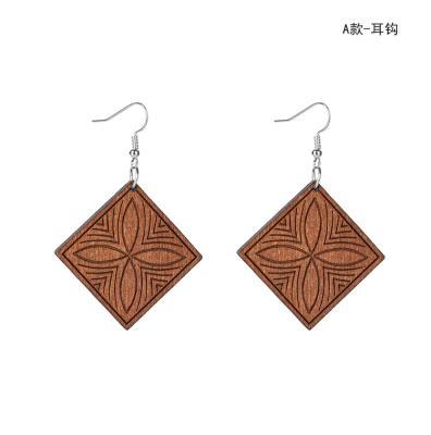 China 2021 New Vintage Retro Creative Earrings Simple Ethnic Style Carved Brown Wooden Earrings for sale