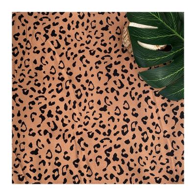 China Fashion Pure Translucent Leopard 100%Printed Romantic Floral Tulle Fabric For Woman Cloth for sale