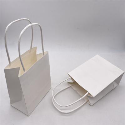 China Recycled Materials Accept Custom Printing Kraft Paper Bag With Handle Feature Brand Recyclable Paper Shopping Bag for sale