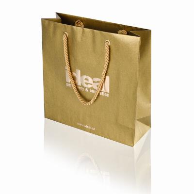 China Recyclable Factory Stocked Matt Shopping Bag High Quality Paper Packaging Bag White Paper Bag With Custom Logo for sale