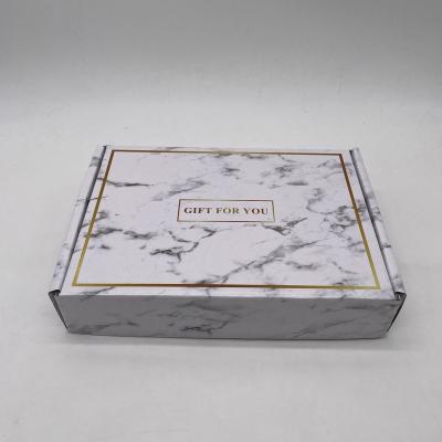 China Recyclable Customized Printing Paper Cardboard Recyclable Bright Marble Film Cardboard Corrugated Box for sale