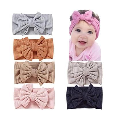 China Wholesale Soft Stretchy Baby Bow Knot Elastic Kids Super Hair Friendly Material Knitted Fabric Headband Kids Hair Accessories for sale