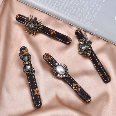 China Popular Selling INS Retro Pearl Rhinestone Hair Clip Side Clip Hair Accessories Small Incense Soft Leather Baroque Style For Women for sale