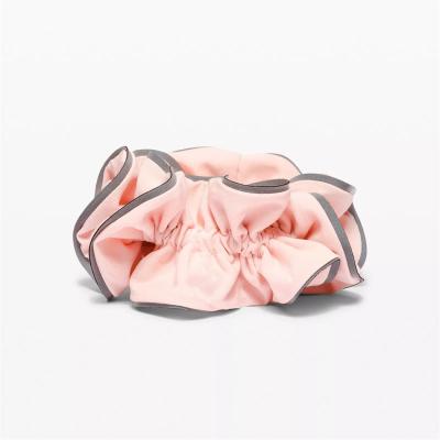 China Popular Wholesale Solid Color Sports Hair Band Printing Hair Accessories Girls Colorful Light Locks Reflective Scrunchies Hair Ties for sale