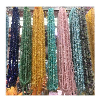 China China Bulk Wholesale Natural Crystal Quartz Tumbled Stones Gravels Crystal Chips With Holes Beads Gem Crystal Necklace for sale