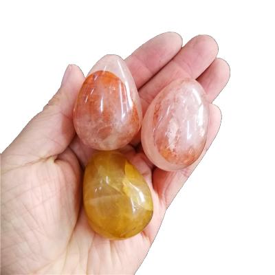 China Semi precious stone China gemstone Yoni egg jade egg natura stone crystal polished red quartz citrine crystal egg for sale