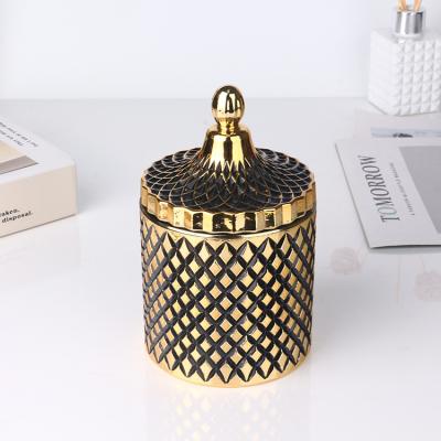 China Home decoration candle holders, lanterns and empty engraved glass candle jars for candles with top for sale