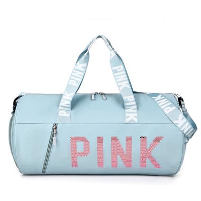 China Custom logo eco-friendly pink barrel shape outdoor sports duffel bag women yoga gym travel waterproof bag with shoe compartment for sale