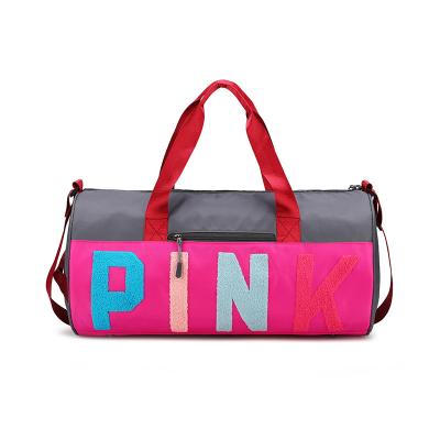 China 2021 YIWU Pink Letters Duffle Gym Sports Bags Eco-friendly Multi Color New Fitness For Gym Travel Custom Logo Bag for sale