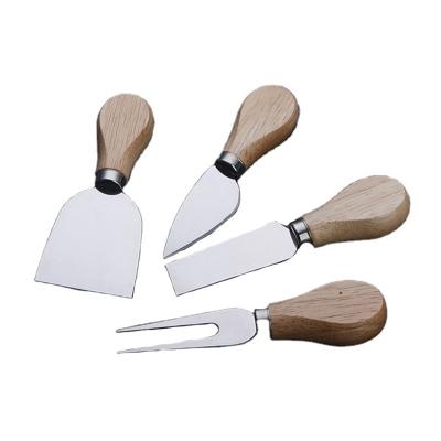 China Hot Selling Viable 4 Pcs Stainless Steel Pizza Knife Sets Multifunctional Kitchen Tools Cheese Cutter Knife for sale