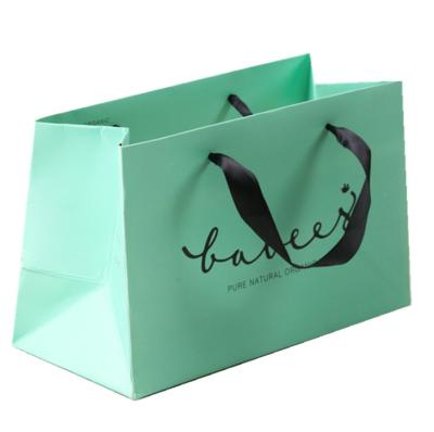 China Recyclable Guang Hang A Handle Custom Luxury Paper Flower Kraft Paper Bag Black Gray Shopping Kraft Paper Bag With Ribbon for sale