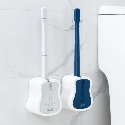 China Durable Plastic Silicone Toilet Cleaning Kit With Bristle Brush Space Saving Bathroom Toilet Bowl Wall Mounted Rubbing Brush Holder for sale