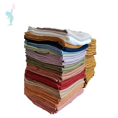 China Sustainable Custom Solid Multi Color Baby Muslin Wrap Cute 100% Cotton Blanket for sale