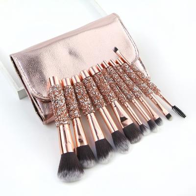 China Angular Blush Diamond Clear Rhinestone Makeup Brush Set Custom Rose Gold Makeup Brush Set With Bag for sale