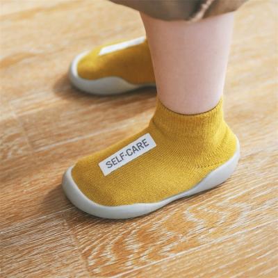 China Single Walker Girl Kids Soft Rubber First Infant Toddler Unisex Slip-On Shoes Knit Booties Anti-Skid for sale