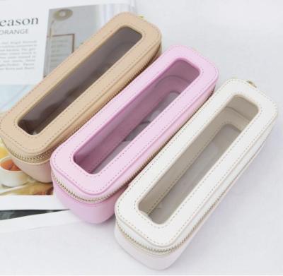 China Wholesale Simple Transparent Leather Mini Eye Pencil Bag Makeup Travel Cosmetic Case TPU New Arrival Brush Cosmetic Bag for sale