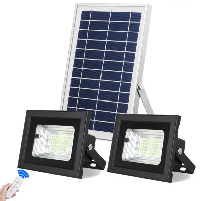 China Sunbonar Heavy Duty and Multi function Solar led flood light dual head light for the Security street garden lighting for sale