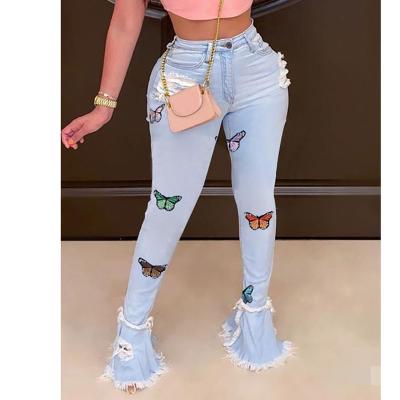 China 2021 good quality breathable cotton butterfly embroidered fashion jeans pants for women clothing ripped blue rocket boot cutouts for sale