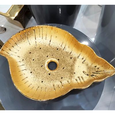 China Countertop Basin Uncommon Shape Single Hole Modern European Style Pure Plating Golden Ceramic Wash Basin for sale