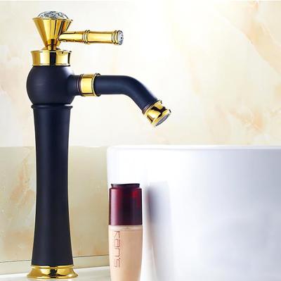 China Metered Faucets Bathroom Countertop Basin Sink Rotating Gold Waterfall Multifunctional Hot And Cold Water Brass Black Faucet for sale