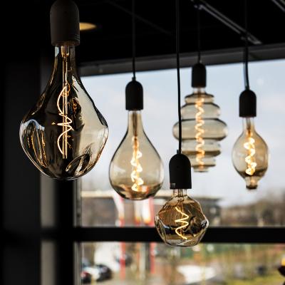 China Outsider 4w Edison Style Smoky Big Light Bulb Soft Flexible Spiral Filament Led Bulb Ps160 Amber Glass Cover Oversize Hotel Curve A165 for sale