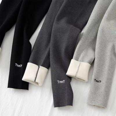 China 2022 Antibacterial Plush Thickened Cotton Winter Yarn Warm Pants Women Vertical Striped Gaiters External Vertical Striped High Waist for sale