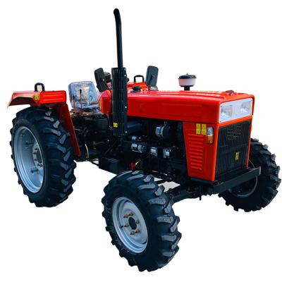 中国 Building Material Shops 2021 Factory Supply Cheap 4x4 Drive Mini Farm Wheeled Tractor For Agriculture 販売のため