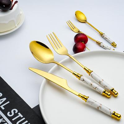 China Sustainable Nordic Style Stainless Steel Cutlery Set Handle Ceramic White Mirror Polish Dinnerware Set for sale