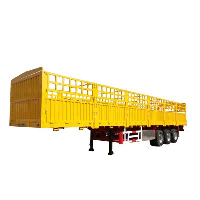 China Truck Trailer Fence Flatbed Semi-Trailer Type Flatbeds with Drop Sideboard Wallside Barrier Semi Trailer for sale