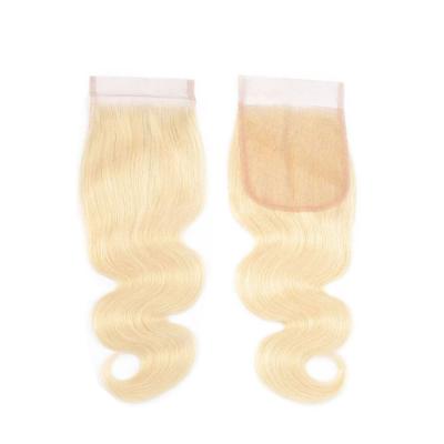 China Ghrehair soft sell 4/4 color 613 body wave closure and bundles wholesale brazilian hair bundles with closure for black women for sale