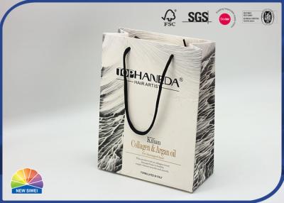 China Custom Paper Shopping Bags With Nylon Handle Matte Lamination for sale