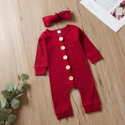 China Autumn Baby Girl Long Sleeve Solid Color Toddler Jumpsuit Solid Cotton Romper With Headband for sale