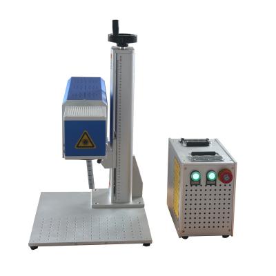 China Laser Marking OPTICAL TECH Manufacturer CO2 RF Jeans Fabric Laser Marking Machine for sale