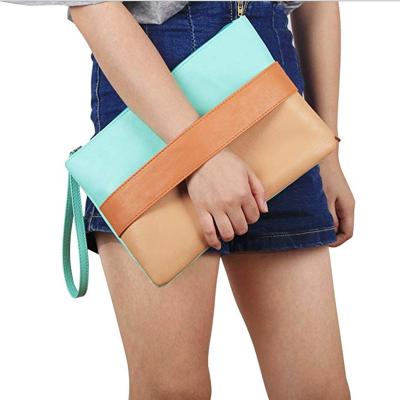 China Color Block Mixed Color Beach PU Leather Clutch Bag Women for sale