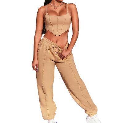 China Cheap Hot Sale Breathable Sexy Sport Jogger 2 Piece Women Pants Sets, Gym One Shoulder Joggers Designer Crop Ladies Slim Fitted Tracksuit for sale