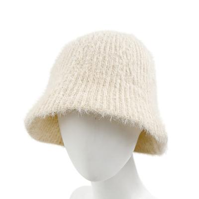 China Knitted wool fur bucket hat winter outdoor street keep warm women's knitted hats for sale