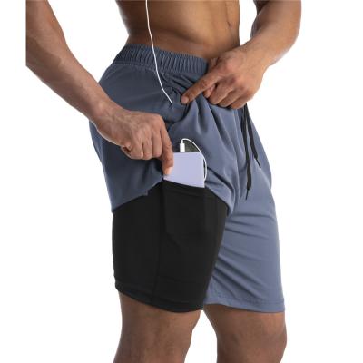 China Wholesale Blank Gym Shorts High Waist Men's Shorts With Pockets Double Layer Fitness Athletic Jogger Running Short for sale