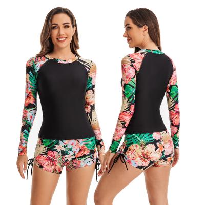 Chine Contrast color wrinkle design split surfwear women swimsuit long-sleeved swimsuit women's fitness swimwear à vendre