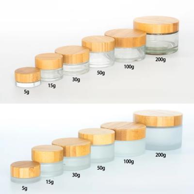 China Cosmetic 5ml - 100ml Bamboo Glass Cap Glass Facial Cream Jar Cosmetic Container For Sale for sale