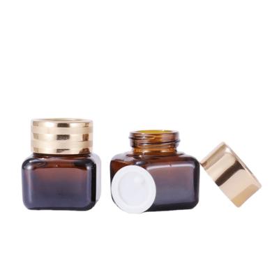 China Small 15g Cosmetic Clear Amber Colored Eye Cream Bottle Square Cream Jar for sale