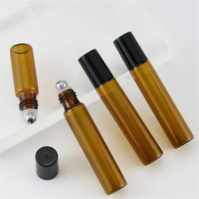 China Cosmetic Tubular Glass Vial 5Ml 10ml Perfume Oil Rollers Bottles Tube Glass Amber Vials With Stainless Steel Trackball for sale