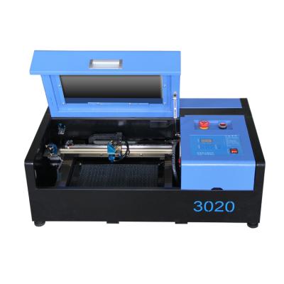 China Laser Cutting Machine / Water Cooled Acrylic Bamboo 3040 Laser Cutting Machine for sale