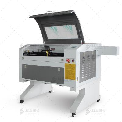 China High Power 4060 100w Mini Water Cooled CO2 Laser Cutting Machine for Plywood, MDF, Wood, Acrylics for sale