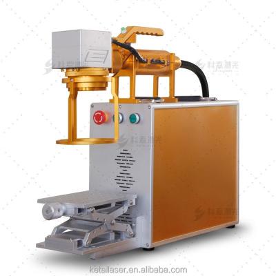 China 30W Laser Air Cooled HANDHELD Head Printing Machine Metal Flexible Marking Engraver for sale