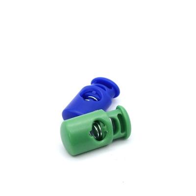 China Nickel Free Plastic Toggle Button Spring Stopper Adjustable Plastic Toggle for Garment Accessories for sale