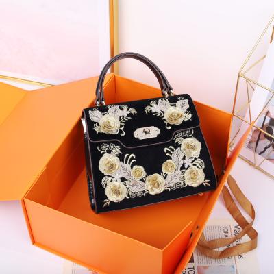 China New trendy fashion PU ladies bags elegance designer handbags for women handmade flowers and embroidery bags factory direct sales 24cm for sale