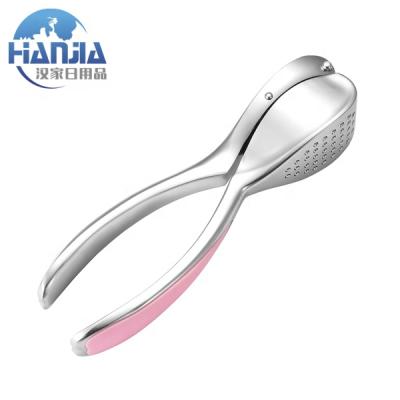 China Kitchen Viable Creative Manual Color Zinc Alloy Pink Garlic Press For Promotion Gift for sale