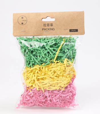 China ANTISTATIC Easter Tissue Paper Multicolor Grass Shredded Raffia Basket Shreds Fold Paper for sale